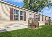 Thumbnail 9 of 14 - Side view of model home at Candlelight Village Manufactured Home Community in Sauk, IL