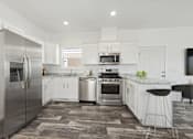 Thumbnail 3 of 19 - Model kitchen at Desert Valley Oasis MHC in Mesa, AZ.