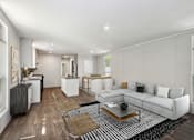 Thumbnail 2 of 15 - Model living room at Southfork MHC in Belton, MO