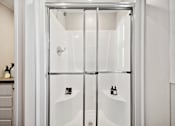 Thumbnail 16 of 25 - Model shower at Cedar Ridge Manufactured Home Community  in Wichita, Kansas