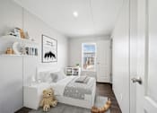 Thumbnail 10 of 25 - Model second bedroom at Cedar Ridge Manufactured Home Community  in Wichita, Kansas