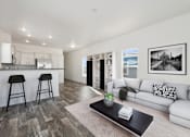 Thumbnail 5 of 19 - Model living room and kitchen at Desert Valley Oasis MHC in Mesa, AZ.
