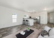 Thumbnail 6 of 19 - Model kitchen and living room at Desert Valley Oasis MHC in Mesa, AZ.