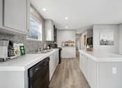 Thumbnail 1 of 25 - Model kitchen at Cedar Ridge Manufactured Home Community  in Wichita, Kansas
