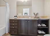Thumbnail 7 of 23 - Bathroom vanity at Verde Plaza Manufactured Home Community in Tucson, Arizona