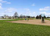 Thumbnail 6 of 7 - Playground at Cedarfield Manufactured Homes Community in Cedar Springs, MI