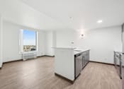 Thumbnail 23 of 45 - A kitchen with white appliances and wooden floors.