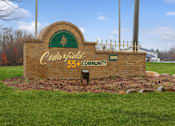 Thumbnail 7 of 7 - Property sign at Cedarfield Manufactured Homes Community in Cedar Springs, MI