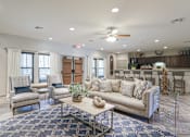 Thumbnail 2 of 35 - A Living Room With a Grey Couch at Arbours at Pierce Creek, Mobile, AL