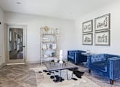 Thumbnail 1 of 35 - A Living Room With a Blue Velvet Sofa at Arbours at Pierce Creek, Mobile, AL, 36608