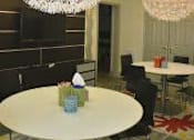 Thumbnail 5 of 21 - A White Table With a Blue Vase at Magnolia Court Apartments, Birmingham
