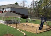 Thumbnail 7 of 21 - A Playground With a Slide at Magnolia Court Apartments, Alabama, 35215