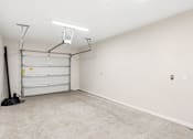 Thumbnail 40 of 41 - A room with a white wall and a white door.