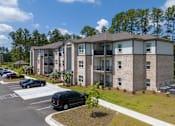 Thumbnail 6 of 8 - Building Exterior View at Arbours at Kingsland, Georgia