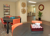 Thumbnail 30 of 32 - A dining room with a round table and chairs at Arbours at Tumblin Creek ~ Active 55+ Adult Community, Gainesville, FL