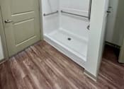 Thumbnail 14 of 21 - A white shower stall in a bathroom at Arbours at Moores Mill, Huntsville Alabama