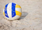 Thumbnail 17 of 18 - A blue and white striped beach ball sits on the sand at Arbours at Ensley Apartments, Pensacola