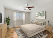 Thumbnail 11 of 27 - A bedroom with a large bed, a ceiling fan, and a plant. at Chatham Hill, New Jersey, 07928
