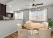 Thumbnail 9 of 27 - A dining room with a round table and chairs. at Chatham Hill, New Jersey, 07928