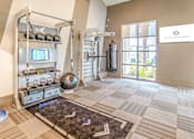 Thumbnail 12 of 55 - Free Weights In Gym at Alys Crossing Apartments, Cypress