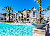 Thumbnail 4 of 55 - Swimming Pool And Fountain at Alys Crossing Apartments, Cypress, Texas