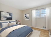 Thumbnail 18 of 27 - A bedroom with a large bed and two framed pictures on the wall. at Chatham Hill, New Jersey, 07928
