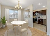 Thumbnail 15 of 27 - A dining room with a white table and chairs. at Chatham Hill, New Jersey, 07928