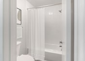 Thumbnail 18 of 52 - a white bathroom with a shower and a toilet at Riverchase Landing, Alabama