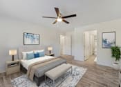 Thumbnail 19 of 52 - a bedroom with a large bed and a ceiling fan at Riverchase Landing, Hoover, 35244
