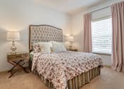 Thumbnail 19 of 24 - Bedroom with large window at Broadstreet at EastChase Apartments, Alabama