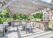 Thumbnail 6 of 24 - Grilling Area at Broadstreet at EastChase Apartments, Montgomery