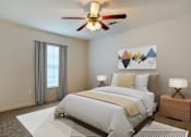 Thumbnail 15 of 31 - Crosswinds Bedroom with ceiling fan and light at Crosswinds Apartments, Pearl