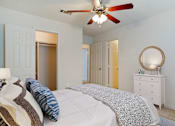 Thumbnail 22 of 31 - Bedroom with cozy bed at Crosswinds Apartments, Pearl, 39208