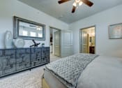 Thumbnail 30 of 34 - Bedroom with bed, lampsat Estraya Westover Hills, San Antonio at Estraya Westover Hills, San Antonio