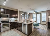 Thumbnail 12 of 38 - Efficient Appliances In Kitchen at Fifty02 Westover Hills, San Antonio, TX