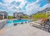 Thumbnail 32 of 38 - Swimming Pool And Relaxing Area at Fifty02 Westover Hills, San Antonio