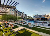 Thumbnail 37 of 38 - Poolside Sundeck With Relaxing Chairs at Fifty02 Westover Hills, San Antonio, 78251