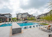 Thumbnail 33 of 38 - Pool Side Relaxing Area With Sundeck at Fifty02 Westover Hills, Texas