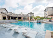 Thumbnail 35 of 38 - Relaxing Pool Area With Sundeck at Fifty02 Westover Hills, San Antonio, TX, 78251