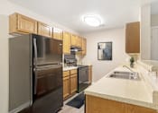 Thumbnail 14 of 26 - Kitchen at Grand at Pearl Apartments, Pearl, 39208