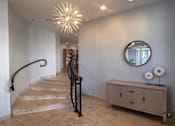 Thumbnail 36 of 46 - a view of the lobby of a house with stairs at Pier Village Apartments, New Jersey