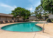 Thumbnail 2 of 32 - Pool Side Relaxing Area at Lakeshore Landing Apartments, Ridgeland, MS