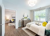 Thumbnail 28 of 47 - Bedroom with cozy bed at Lumen Apartments, Virginia