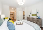 Thumbnail 29 of 47 - Bedroom with ceiling fan and light at Lumen Apartments, Hampton