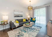 Thumbnail 15 of 47 - Lumen Living room with couch at Lumen Apartments, Hampton, 23666