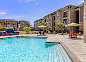 Thumbnail 22 of 33 - Pool with Relaxing Area at Mansfield on the Green, Texas, 76063