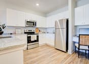Thumbnail 14 of 29 - Fully Equipped Kitchen at Midtown Row, Montgomery, AL