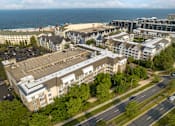 Thumbnail 4 of 46 - an aerial view of a city with buildings and the ocean at Pier Village Apartments, New Jersey