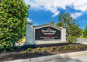 Thumbnail 2 of 31 - a sign apartments in front of trees at Quail Ridge, Plainsboro Township