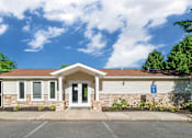 Thumbnail 31 of 31 - a small white house with a sidewalk in front of it at Quail Ridge, Plainsboro Township